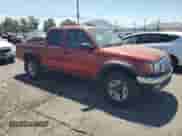 2002 Toyota Tacoma PreRunner z VIN 5TEGM92N62Z118802, wystawiony jako Copart lot #66684755 z przebiegiem 216 147 mil mil oraz Szkoda całkowita • Salvage title. Historia ofert i sprzedaży dostępna na DreamBid. Obrazek 4.