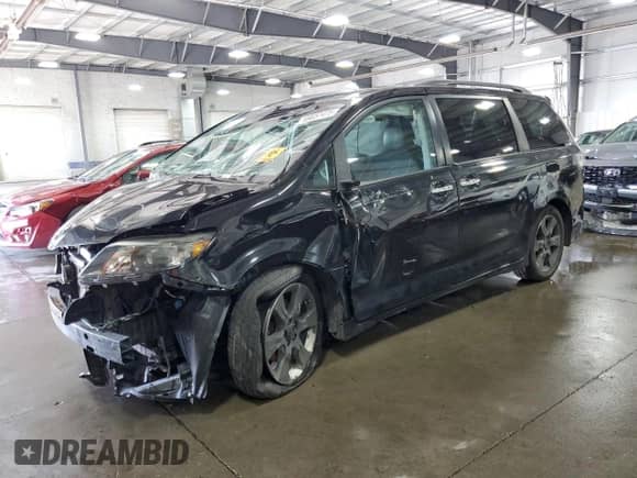 2014 Toyota Sienna SE with VIN 5TDXK3DC7ES482016, listed as a Copart auction lot 69857475 with 136,304 mi miles and Salvage title. Bid and sale history available at DreamBid. Image 1.