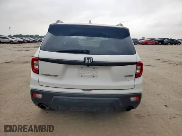 2020 Honda Passport Touring with VIN 5FNYF7H97LB000127, listed as a Copart auction lot 57613775 with 68,851 mi miles and Salvage title. Bid and sale history available at DreamBid. Image 6.
