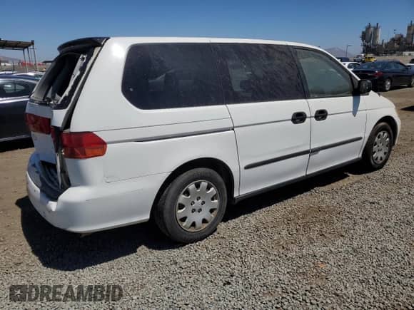 2000 Honda Odyssey LX с VIN 2HKRL1853YH501726, выставлен на аукционе Copart как лот 66131765 с пробегом 180 430 миль миль и Списание • Salvage title. История ставок и продаж доступна на DreamBid. Изображение 3.