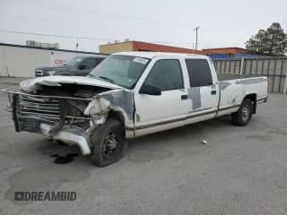 1998 Chevrolet Silverado 3500 с VIN 1GCGC33R6WF062753, выставлен на аукционе Copart как лот 67075235 с пробегом 239 037 миль миль и Списание • Salvage title. История ставок и продаж доступна на DreamBid. Изображение 1.