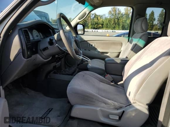 2002 Toyota Tacoma z VIN 5TEWN72NX2Z070220, wystawiony jako Copart lot #81276465 z przebiegiem 143 793 mil mil oraz Szkoda całkowita • Salvage title. Historia ofert i sprzedaży dostępna na DreamBid. Obrazek 7.