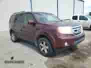 2010 Honda Pilot EX with VIN 5FNYF3H4XAB013755, listed as a Copart auction lot 82045195 with 233,996 mi miles and Salvage title. Bid and sale history available at DreamBid. Image 4.