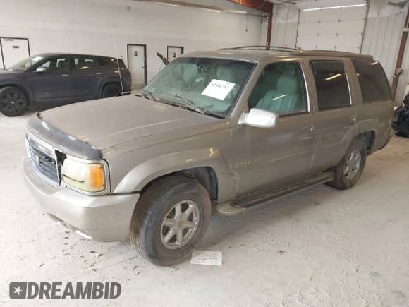 2000 Cadillac Escalade with VIN 1GYEK13R9YR122289, listed as a IAAI auction lot 42586757 with 241,346 mi miles and . Bid and sale history available at DreamBid. Image 2.