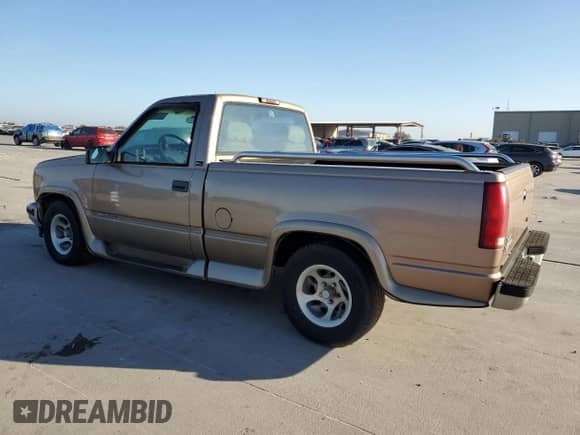 1997 GMC Sierra 1500 SL с VIN 1GTEC14W7VZ503500, выставлен на аукционе Copart как лот 77563774 с пробегом 172 780 миль миль и Чистый • Clean title. История ставок и продаж доступна на DreamBid. Изображение 2.