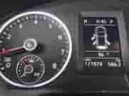 2011 Volkswagen Tiguan S with VIN WVGBV7AXXBW560022, listed as a IAAI auction lot 42693212 with 127,879 mi miles and . Bid and sale history available at DreamBid. Image 7.