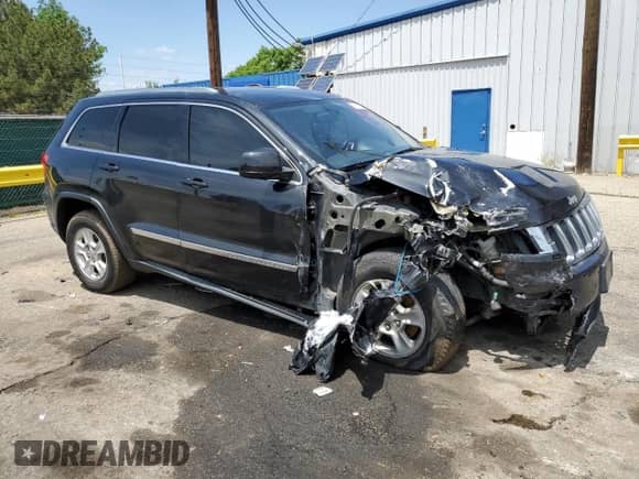 2012 Jeep Grand Cherokee Laredo с VIN 1C4RJEAT6CC301188, выставлен на аукционе Copart как лот 59602325 с пробегом 163 126 миль миль и Списание • Salvage title. История ставок и продаж доступна на DreamBid. Изображение 4.