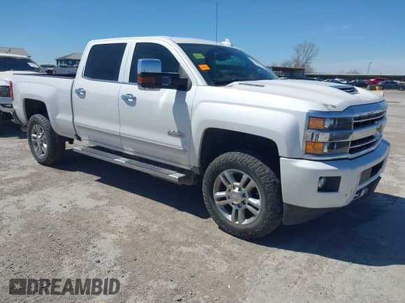 2019 Chevrolet Silverado 2500HD High Country z VIN 1GC1KUEY8KF171437, wystawiony jako IAAI lot #41850872 z przebiegiem 114 027 mil mil oraz . Historia ofert i sprzedaży dostępna na DreamBid. Obrazek 1.
