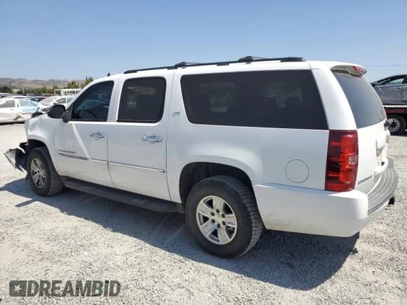 2009 Chevrolet Suburban LTZ с VIN 1GNFK36389R197216, выставлен на аукционе Copart как лот 60930325 с пробегом 226 026 миль миль и Списание • Salvage title. История ставок и продаж доступна на DreamBid. Изображение 2.