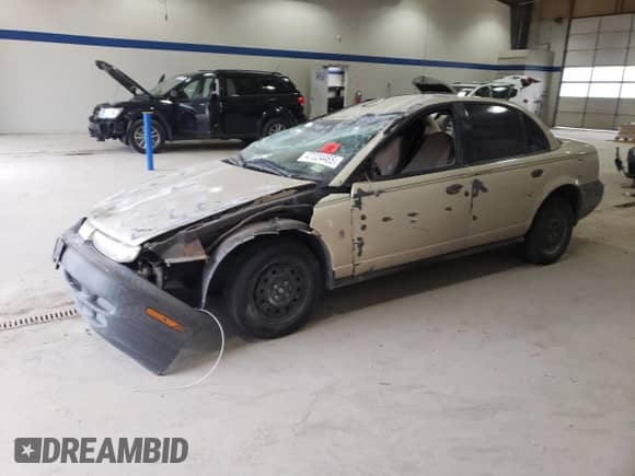 1997 Saturn SL with VIN 1G8ZH5288VZ126846, listed as a Copart auction lot 47024465 with 152,336 mi miles and Salvage title. Bid and sale history available at DreamBid. Image 1.