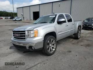 2013 GMC Sierra 1500 SLE with VIN 3GTP1VE07DG328986, listed as a Copart auction lot 71232365 with 217,067 mi miles and Salvage title. Bid and sale history available at DreamBid. Image 1.