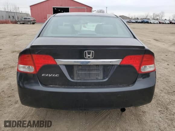 2010 Honda Civic with VIN 2HGFA1F25AH015520, listed as a Copart auction lot 50523565 with 169,256 mi miles and Salvage title. Bid and sale history available at DreamBid. Image 6.