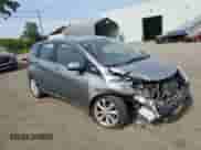 2014 Nissan Note SV with VIN 3N1CE2CP4EL360470, listed as a Copart auction lot 80289105 with 97,859 mi miles and Salvage title. Bid and sale history available at DreamBid. Image 4.