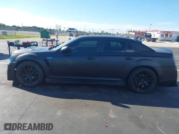 2012 Chrysler 300 z VIN 2C3CCAAG2CH237874, wystawiony jako IAAI lot #43434568 z przebiegiem 87 998 mil mil oraz . Historia ofert i sprzedaży dostępna na DreamBid. Obrazek 14.