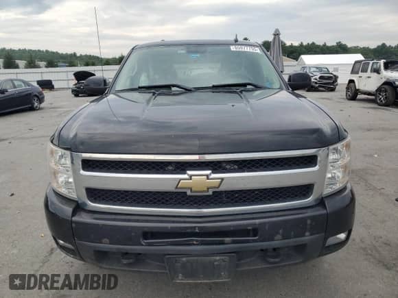 2011 Chevrolet Silverado 1500 LTZ z VIN 1GCRKTE3XBZ172556, wystawiony jako Copart lot #65977755 z przebiegiem Nie podano mil oraz Szkoda całkowita • Salvage title. Historia ofert i sprzedaży dostępna na DreamBid. Obrazek 5.
