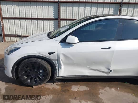 2022 Tesla Model Y Long Range z VIN 7SAYGDEE1NA003346, wystawiony jako IAAI lot #42966899 z przebiegiem 86 422 mil mil oraz . Historia ofert i sprzedaży dostępna na DreamBid. Obrazek 6.