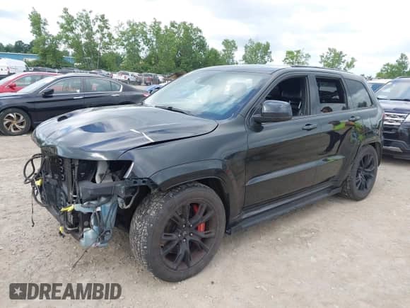 2015 Jeep Grand Cherokee SRT with VIN 1C4RJFDJ8FC768262, listed as a IAAI auction lot 42739805 with 86,840 mi miles and . Bid and sale history available at DreamBid. Image 2.