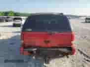 2000 Chevrolet Blazer LS with VIN 1GNDT13W5Y2280679, listed as a Copart auction lot 64712735 with Not provided miles and Salvage title. Bid and sale history available at DreamBid. Image 6.