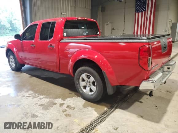 2010 Nissan Frontier SE with VIN 1N6AD0FV6AC406292, listed as a Copart auction lot 84029595 with 94,128 mi miles and Salvage title. Bid and sale history available at DreamBid. Image 2.