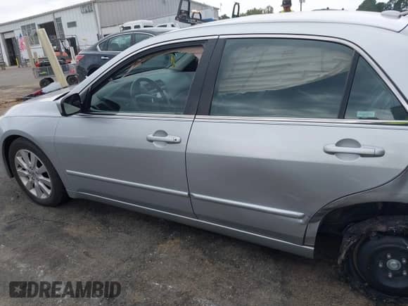 2007 Honda Accord EX-L with VIN 1HGCM66587A019778, listed as a IAAI auction lot 43104338 with 128,323 mi miles and . Bid and sale history available at DreamBid. Image 14.