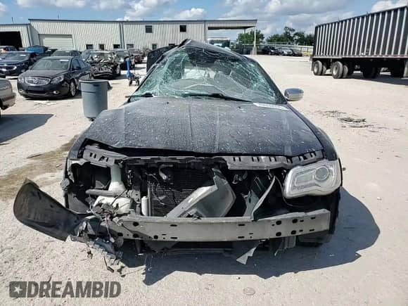 2011 Chrysler 300 Limited с VIN 2C3CA5CG6BH593852, выставлен на аукционе Copart как лот 70000995 с пробегом 163 054 миль миль и Списание • Salvage title. История ставок и продаж доступна на DreamBid. Изображение 13.