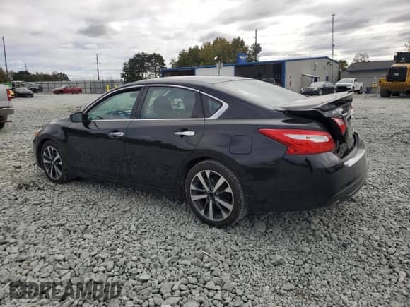 2016 Nissan Altima SR with VIN 1N4AL3AP0GC285130, listed as a Copart auction lot 86660045 with 100,458 mi miles and Salvage title. Bid and sale history available at DreamBid. Image 2.