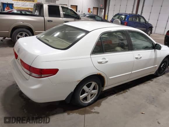 2003 Honda Accord EX with VIN JHMCM56663C078519, listed as a IAAI auction lot 43506906 with 17,447 mi miles and . Bid and sale history available at DreamBid. Image 4.