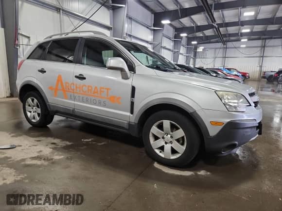 2012 Chevrolet Captiva Sport LS with VIN 3GNAL2EK2CS579515, listed as a Copart auction lot 68123195 with 105,911 mi miles and Salvage title. Bid and sale history available at DreamBid. Image 4.
