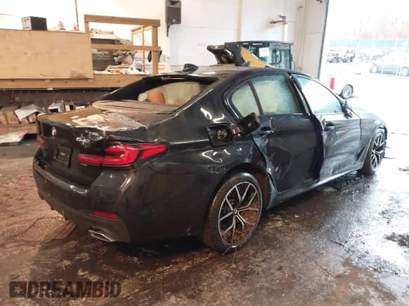 2021 BMW 5 Series 540i xDrive with VIN WBA73BJ05MWW98654, listed as a IAAI auction lot 41083692 with Not provided miles and . Bid and sale history available at DreamBid. Image 4.