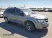 2009 Dodge Journey SXT with VIN 3D4GH57V99T171841, listed as a Copart auction lot 68777785 with 169,668 mi miles and Salvage title. Bid and sale history available at DreamBid. Image 4.