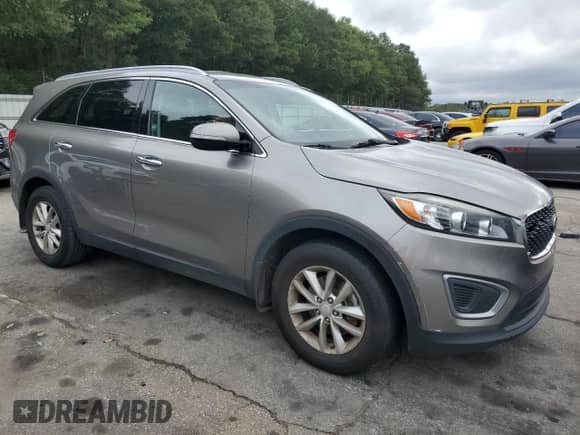 2016 Kia Sorento LX with VIN 5XYPG4A36GG076787, listed as a Copart auction lot 82225895 with 167,301 mi miles and Clean title. Bid and sale history available at DreamBid. Image 4.