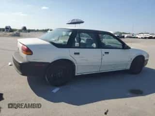 1995 Saturn SL с VIN 1G8ZH5284SZ246882, выставлен на аукционе Copart как лот 81402775 с пробегом 155 762 миль миль и Чистый • Clean title. История ставок и продаж доступна на DreamBid. Изображение 3.