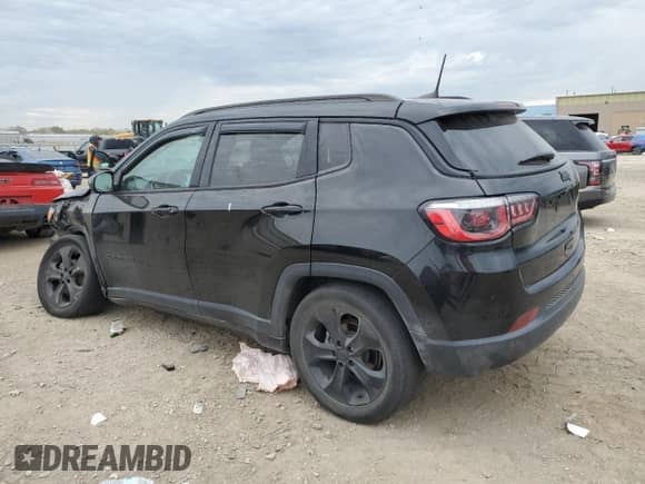 2019 Jeep Compass Altitude with VIN 3C4NJCBB2KT706637, listed as a Copart auction lot 86140265 with 161,415 mi miles and Salvage title. Bid and sale history available at DreamBid. Image 2.