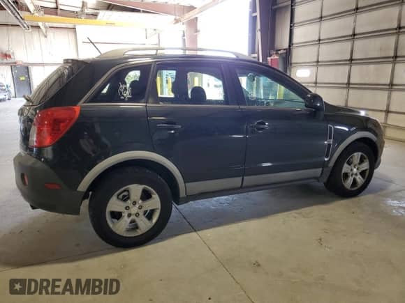 2014 Chevrolet Captiva Sport LS z VIN 3GNAL2EK8ES569266, wystawiony jako Copart lot #71693175 z przebiegiem 86 167 mil mil oraz Szkoda całkowita • Salvage title. Historia ofert i sprzedaży dostępna na DreamBid. Obrazek 3.