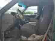 1999 Ford F-150 z VIN 1FTRX18W8XNB82710, wystawiony jako Copart lot #58264745 z przebiegiem Nie podano mil oraz Szkoda całkowita • Salvage title. Historia ofert i sprzedaży dostępna na DreamBid. Obrazek 7.