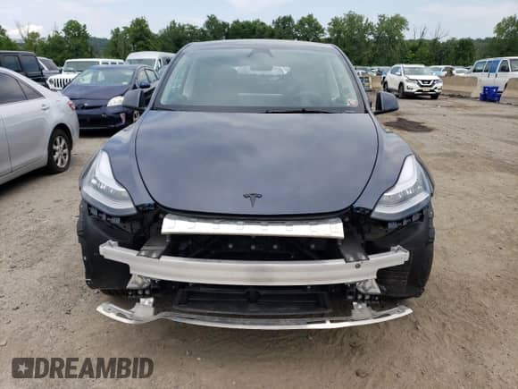 2023 Tesla Model Y Long Range с VIN 7SAYGDEE0PA156044, выставлен на аукционе Copart как лот 63698664 с пробегом 17 274 миль миль и Списание • Salvage title. История ставок и продаж доступна на DreamBid. Изображение 5.