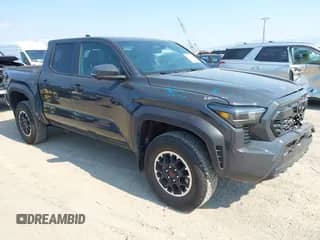 2024 Toyota Tacoma TRD Off Road with VIN 3TMLB5JN7RM069938, listed as a IAAI auction lot 43056789 with 6,837 mi miles and . Bid and sale history available at DreamBid. Image 1.