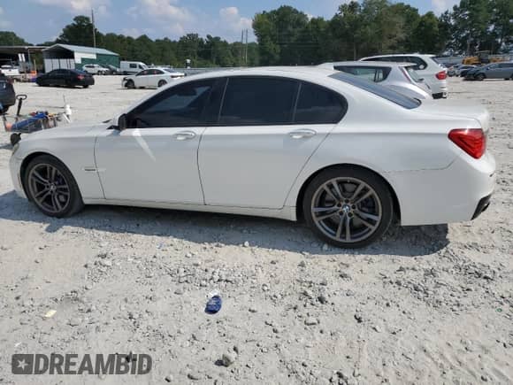 2011 BMW 7 Series 750i with VIN WBAKA8C54BCY36534, listed as a Copart auction lot 71793725 with 157,203 mi miles and Clean title. Bid and sale history available at DreamBid. Image 2.