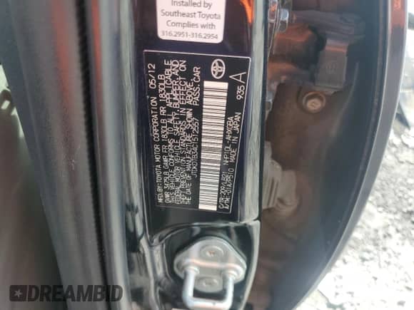 2012 Toyota Prius Four z VIN JTDKDTB34C1512557, wystawiony jako Copart lot #81591185 z przebiegiem Nie podano mil oraz Szkoda całkowita • Salvage title. Historia ofert i sprzedaży dostępna na DreamBid. Obrazek 12.