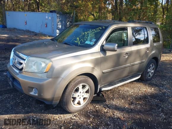 2009 Honda Pilot Touring with VIN 5FNYF48979B007005, listed as a IAAI auction lot 43454497 with 128,268 mi miles and . Bid and sale history available at DreamBid. Image 17.