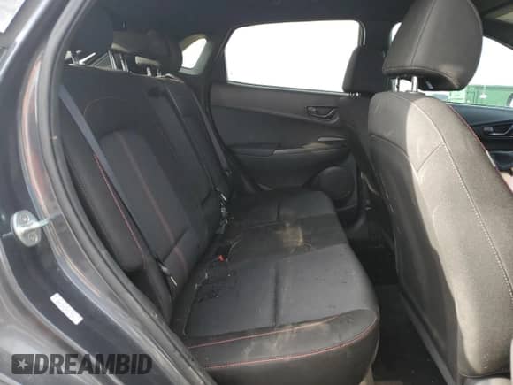 2022 Hyundai Kona N Line z VIN KM8K33A34NU779151, wystawiony jako Copart lot #60482795 z przebiegiem 75 236 mil mil oraz Szkoda całkowita • Salvage title. Historia ofert i sprzedaży dostępna na DreamBid. Obrazek 11.