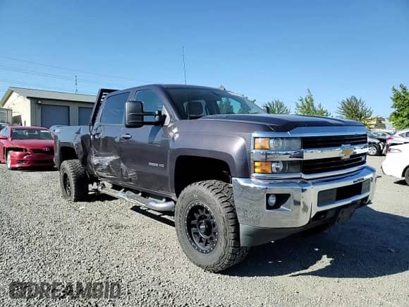 2015 Chevrolet Silverado 2500HD LT with VIN 1GC1KVE86FF145124, listed as a Copart auction lot 69462005 with 142,262 mi miles and Salvage title. Bid and sale history available at DreamBid. Image 13.