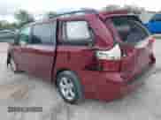 2014 Toyota Sienna LE AAS with VIN 5TDKK3DC7ES435563, listed as a IAAI auction lot 43014633 with 201,161 mi miles and . Bid and sale history available at DreamBid. Image 3.