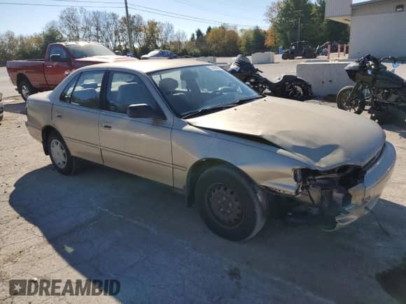1995 Toyota Camry DX z VIN 4T1SK11E0SU634144, wystawiony jako Copart lot #77469074 z przebiegiem 123 359 mil mil oraz Czysty tytuł • Clean title. Historia ofert i sprzedaży dostępna na DreamBid. Obrazek 4.