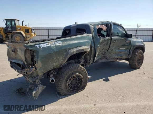 2021 Toyota Tacoma TRD Off Road с VIN 3TMCZ5AN4MM444916, выставлен на аукционе Copart как лот 81633635 с пробегом 47 696 миль миль и Списание • Salvage title. История ставок и продаж доступна на DreamBid. Изображение 3.