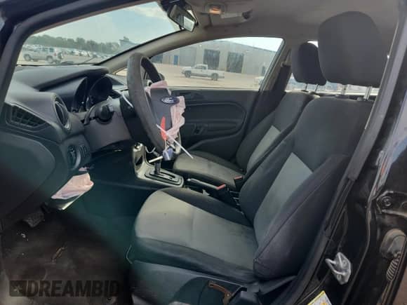 2015 Ford Fiesta S z VIN 3FADP4TJ1FM173059, wystawiony jako Copart lot #86705795 z przebiegiem 107 444 mil mil oraz Szkoda całkowita • Salvage title. Historia ofert i sprzedaży dostępna na DreamBid. Obrazek 7.