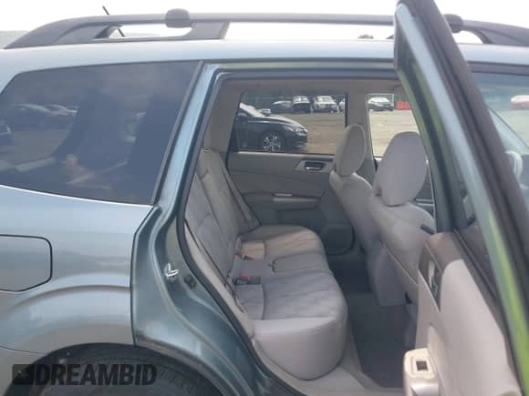 2009 Subaru Forester X with VIN JF2SH63689G756041, listed as a IAAI auction lot 42879883 with 105,452 mi miles and . Bid and sale history available at DreamBid. Image 8.