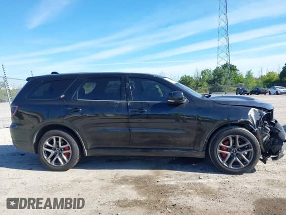 2020 Dodge Durango R/T with VIN 1C4SDJCT7LC257409, listed as a IAAI auction lot 43088237 with 93,258 mi miles and . Bid and sale history available at DreamBid. Image 12.