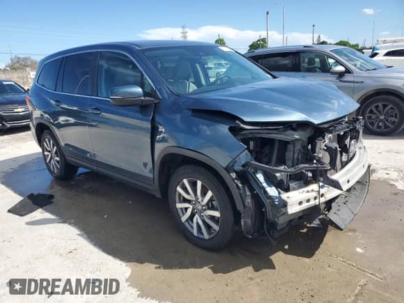 2021 Honda Pilot EX with VIN 5FNYF5H33MB027116, listed as a Copart auction lot 70897255 with 55,433 mi miles and Clean title. Bid and sale history available at DreamBid. Image 4.