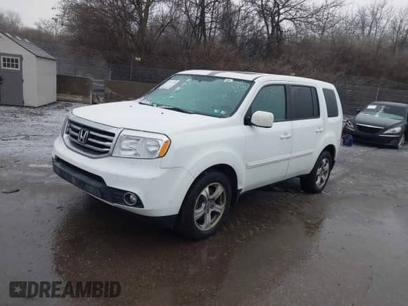 2014 Honda Pilot EX-L with VIN 5FNYF4H79EB024798, listed as a IAAI auction lot 41523720 with 149,717 mi miles and . Bid and sale history available at DreamBid. Image 17.